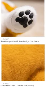 Detail of plush Shiba Inu blanket showing soft fabric texture and black paw print design