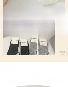 Close-up of vertical ribbed texture on grey combed cotton low-cut liner socks