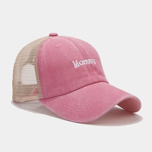 Pink and beige trucker hat with white Mommy embroidery and breathable mesh back