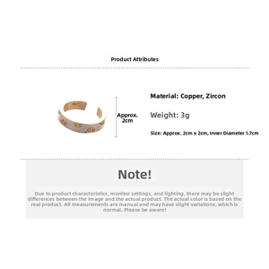 Macro detail of 18k gold plated cross ring with zircon accents and size specifications