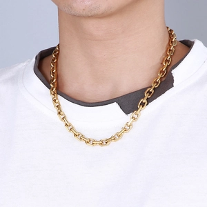 Close-up of men's 18K gold plated stainless steel curb chain necklace on a model