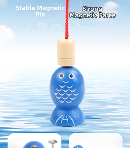 Detail of wooden magnetic fish toy with strong magnet and blue scale pattern