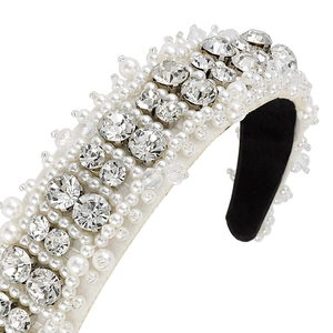 Elegant wide pearl and rhinestone headband with white fabric base and crystal bead details