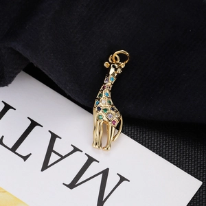 Golden giraffe pendant with colorful zircon stones and a circular ring attachment
