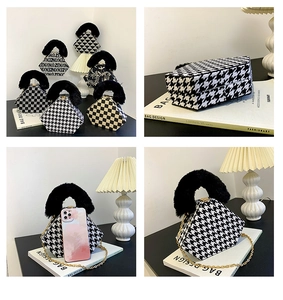 Mini geometric evening bag with plush handle and metal chain in black and white patterns