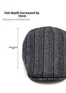 Detail shot of a dark grey striped beret hat with a 10cm deep fit for full coverage