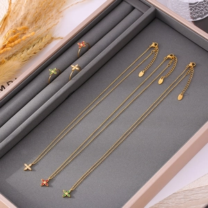 Elegant 18k gold plated four-leaf clover zircon jewelry set with necklace and ring