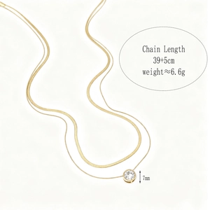 Detail of layered gold necklace showing 39+5cm chain length and 7mm stone pendant dimensions