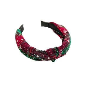 Christmas knotted headband with red and green tartan plaid and white snowflake patterns
