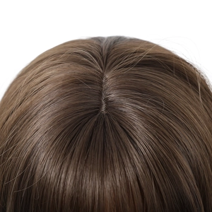 Macro view of realistic scalp and hair parting on long wavy synthetic wig