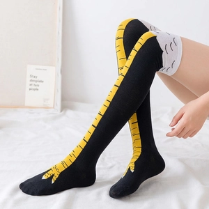 Chaussettes hautes amusantes pattes de poulet avec motif d'os jaune sur tricot noir