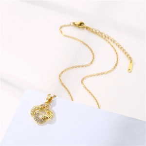 Gold-plated stainless steel four-leaf clover necklace with micro-paved cubic zirconia stones