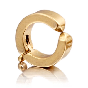 Macro shot of gold-plated stainless steel C-shape ear clip with small ring attachment