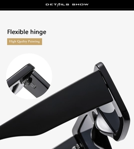 Macro view of flexible metal hinges and high quality painting on black sunglasses