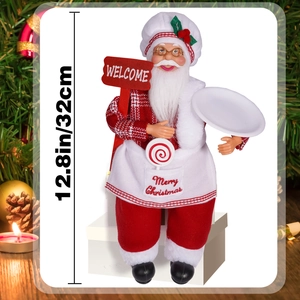 Detail of 12-inch sitting Santa chef doll with Merry Christmas apron and welcome sign