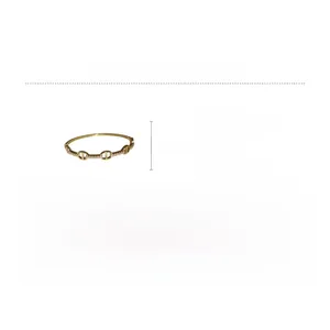 Detail view of gold-plated anchor link bracelet with dimensions and zircon material info