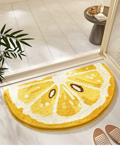 Dettaglio della consistenza del tappetino da bagno semicircolare a forma di limone