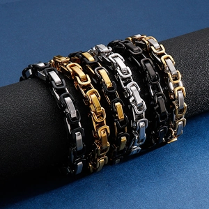 Men's stainless steel byzantine chain bracelets in various colors on display