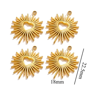 Set of four gold stainless steel heart sunburst charms for DIY jewelry making