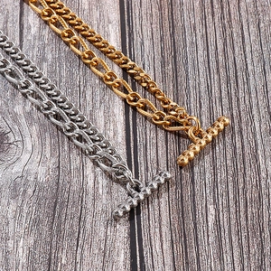 Detailed close-up of heavy stainless steel Cuban chain bracelets with OT toggle clasps