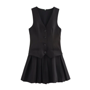 Detail of black pleated skirt and sleeveless vest set in M size with premium fabric texture