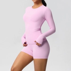 Detail of light purple yoga set featuring functional thumbhole cuffs and slim-fit fabric
