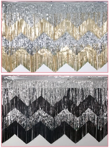 Detail of wavy foil fringe curtains in gold-silver and black-silver for party background
