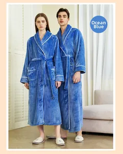 Detail of sea blue flannel robes showing the thick contrast piping and soft coral fleece texture