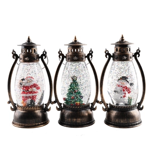 Three bronze Christmas lanterns with Santa, Snowman and Christmas tree scenes