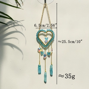 Detailed size and weight view of blue heart crystal suncatcher with golden chain