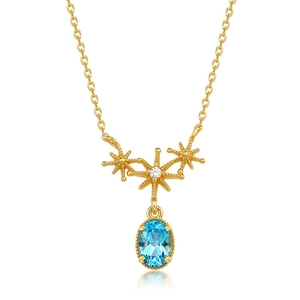 Japanese style S925 silver necklace with blue topaz and gold star pendant on white background