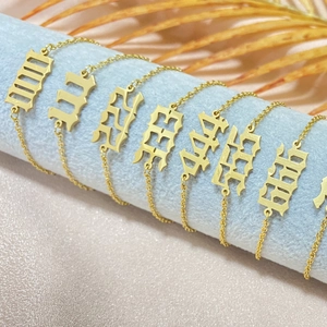 Gold stainless steel angel number 000-999 pendant necklaces with gothic font on blue display