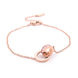 Cavigliera doppio anello oro rosa in acciaio con pietra rosa e numeri romani