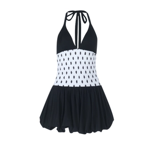 Polka dot deep V-neck halter dress in black and white contrast color A-line design