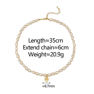 Detail showing freshwater pearl necklace dimensions with golden smiley face charm