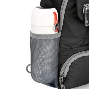 Detail of tear-resistant nylon outdoor bag featuring a side mesh pocket for water bottles