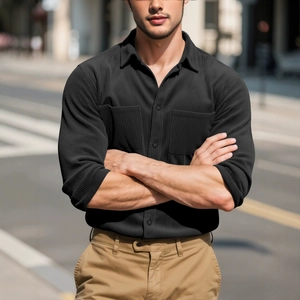Men's slim fit black corduroy jacket with long sleeves and dual chest pockets