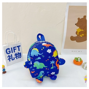 Close-up of cute cartoon dinosaur backpack featuring vivid prints and side 3D decorations