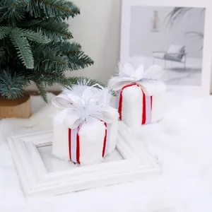 Plush white Christmas gift box ornament with red ribbon and floral pearl details