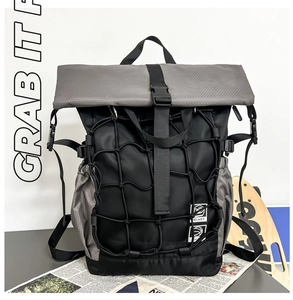 Detail of multi-functional sports backpack featuring a front mesh net for helmet storage