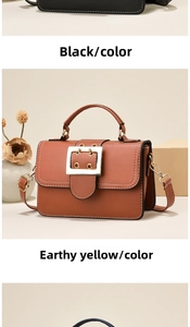 Detail of square crossbody bag showing textured finish and decorative metal buckle
