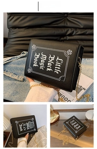 Macro detail of Little Black Magic Book gothic crossbody bag with gold chain strap