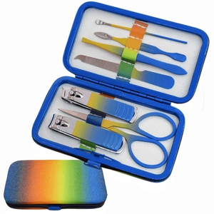 Rainbow gradient stainless steel manicure set with blue carrying case in two views