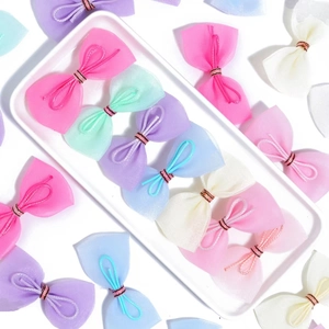 Colorful bow hair accessories with gold wire trim in net yarn fabric for girls
