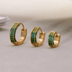 Three-piece set of 18k gold plated stainless steel huggie earrings with green zirconias