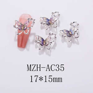 Macro view of MZH-AC35 3D butterfly nail art charms with iridescent wings and tiny pearls