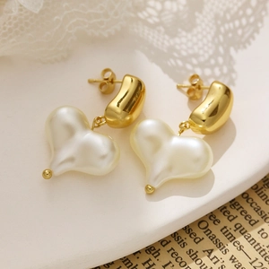 Elegant gold heart pearl drop earrings with vintage French style and high gloss finish
