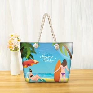 Detail of canvas beach tote with nautical rope handles and summer holiday illustration