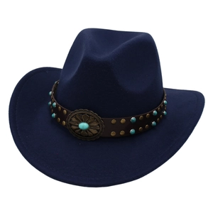 Detail of navy wool felt fedora featuring leather band with turquoise studs and vintage buckle