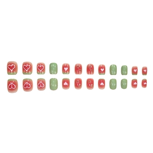 Cute watermelon style press-on nails with heart patterns and glossy finish